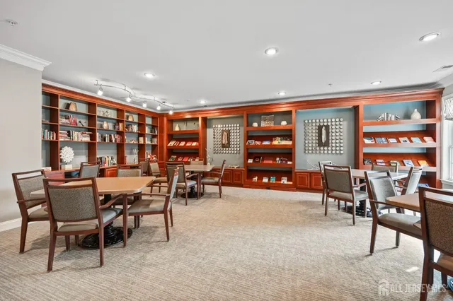 a view of a livingroom with furniture and window