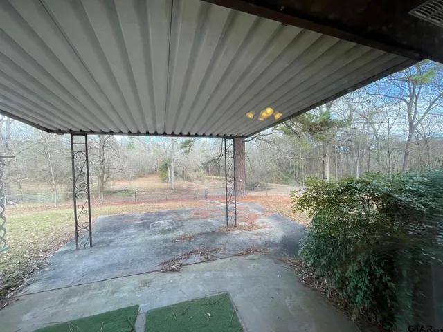 a view of a garage with wooden wall