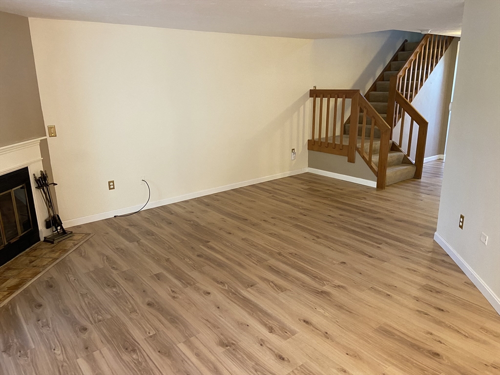 501 Ridgefield Circle, Unit B Clinton, MA 01510 - Photo 9 of 17 a view of entryway with wooden floor