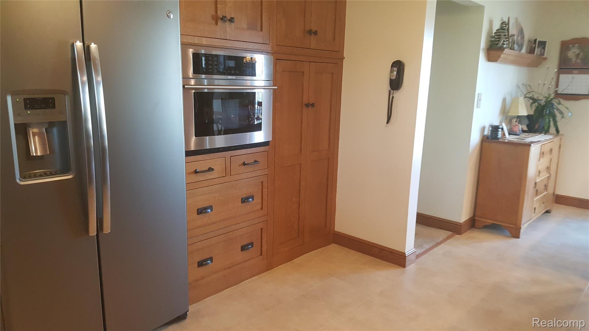 8773 US Turnpike Road Newport, MI 48166 - Photo 17 of 32 Lots of cupboards in kitchen.