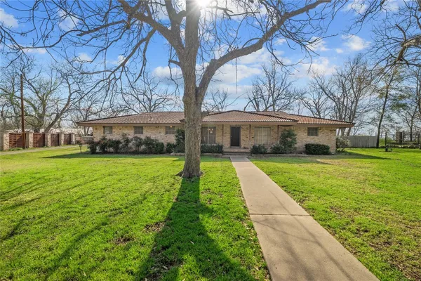 a front view of house with yard