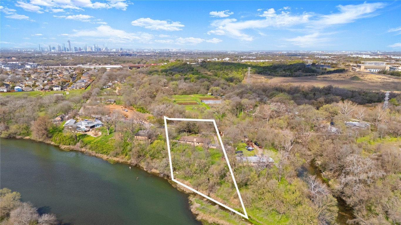 7705 Shelton Road Austin, TX 78725 - Photo 13 of 13 a view of a lake in middle of a city