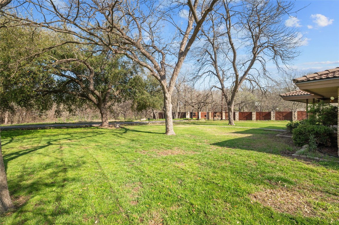 7705 Shelton Road Austin, TX 78725 - Photo 3 of 13 a view of yard with green space