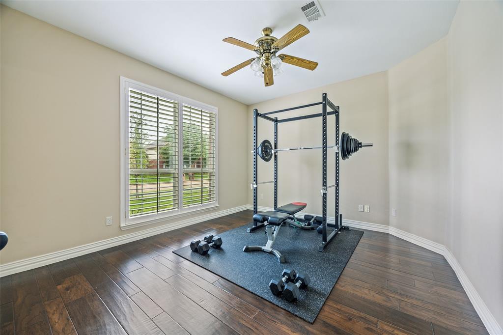 4528 Risinghill Drive Plano, TX 75024 - Photo 18 of 40 a view of a workspace with furniture and a window