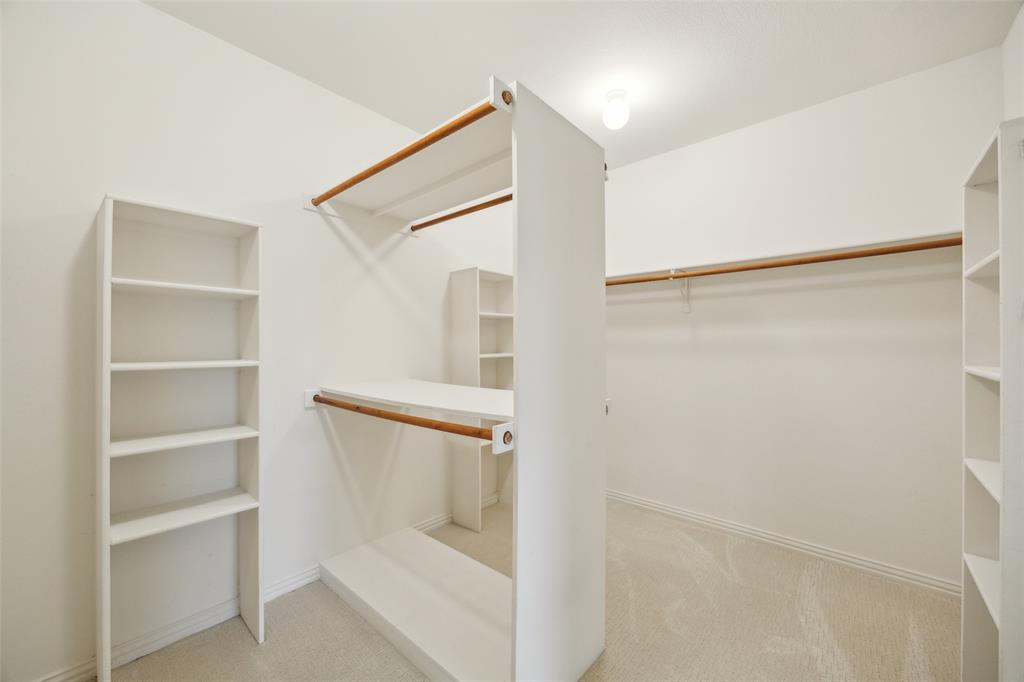 4528 Risinghill Drive Plano, TX 75024 - Photo 26 of 40 a bathroom with a shower and a glass door
