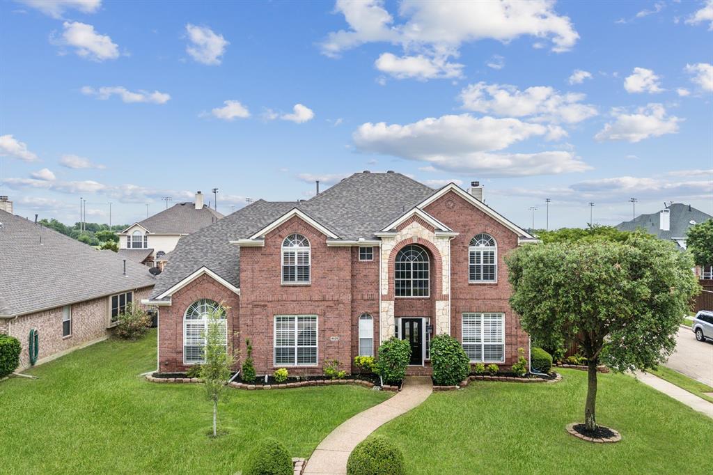 4528 Risinghill Drive Plano, TX 75024 - Photo 3 of 40 a front view of a house with a yard