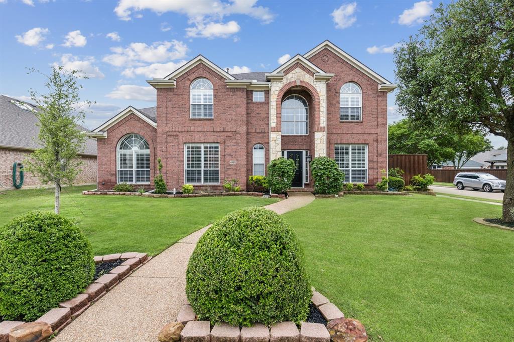 4528 Risinghill Drive Plano, TX 75024 - Photo 5 of 40 a front view of a house with a yard