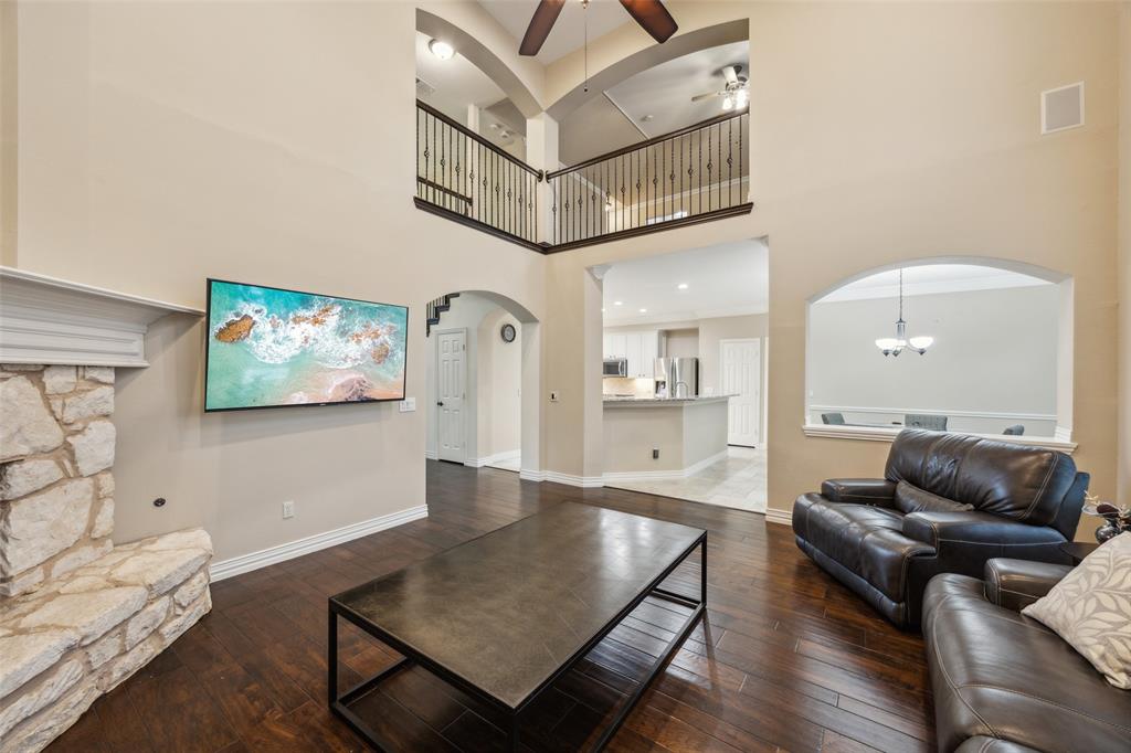 4528 Risinghill Drive Plano, TX 75024 - Photo 10 of 40 a living room with furniture and wooden floor