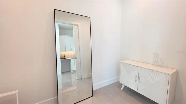 a room with a bed and a window