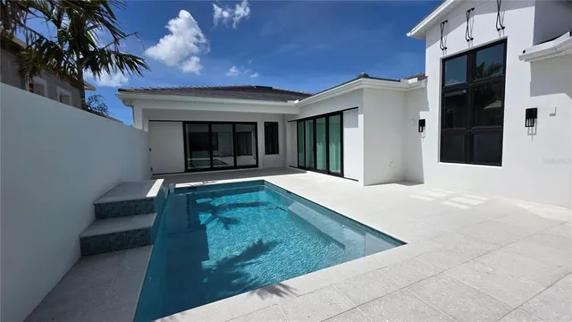 a view of a park with palm trees