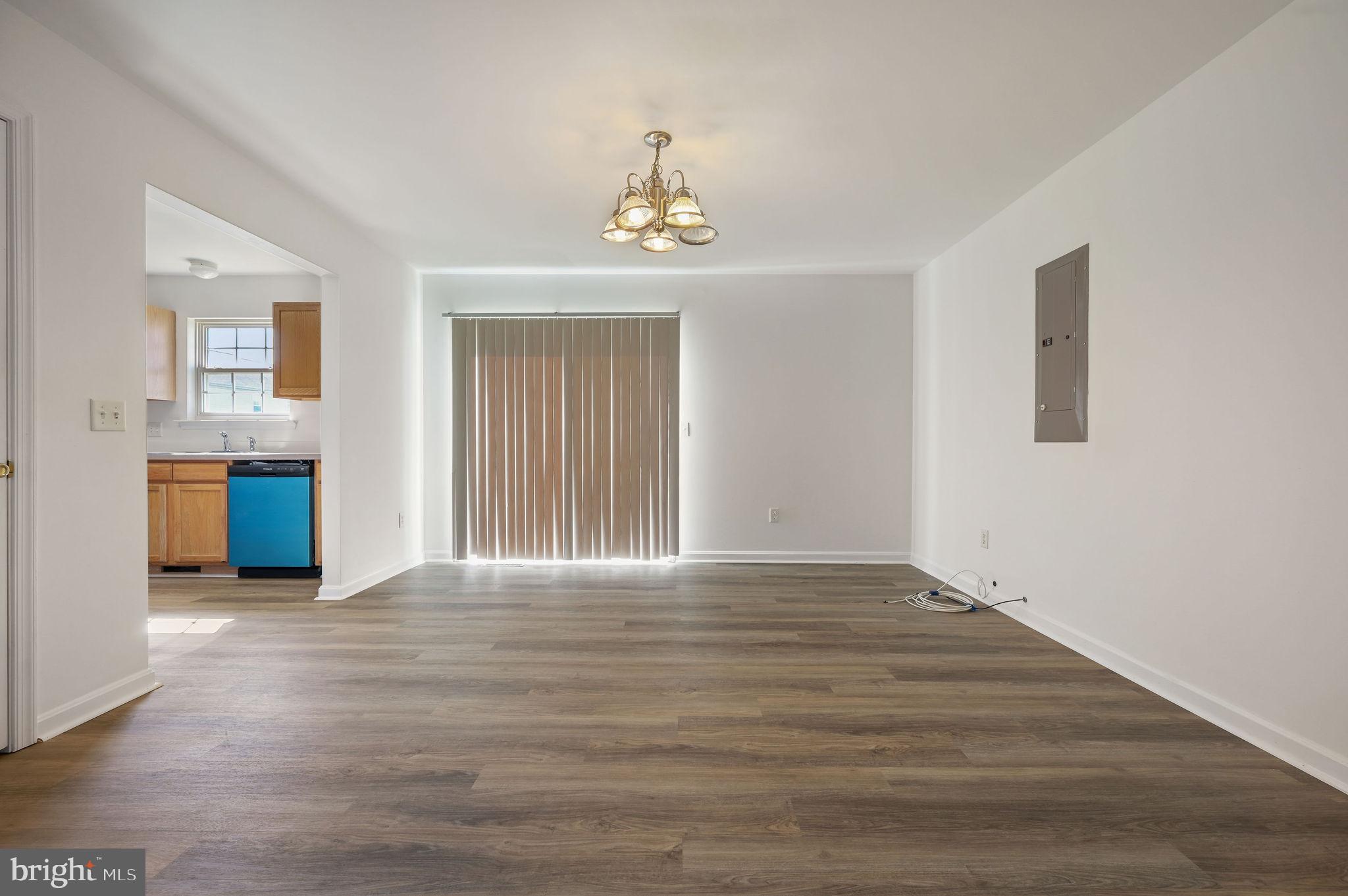 44 Moriarty Street Dover, DE 19901 - Photo 4 of 15 a view of an empty room with window and cabinet