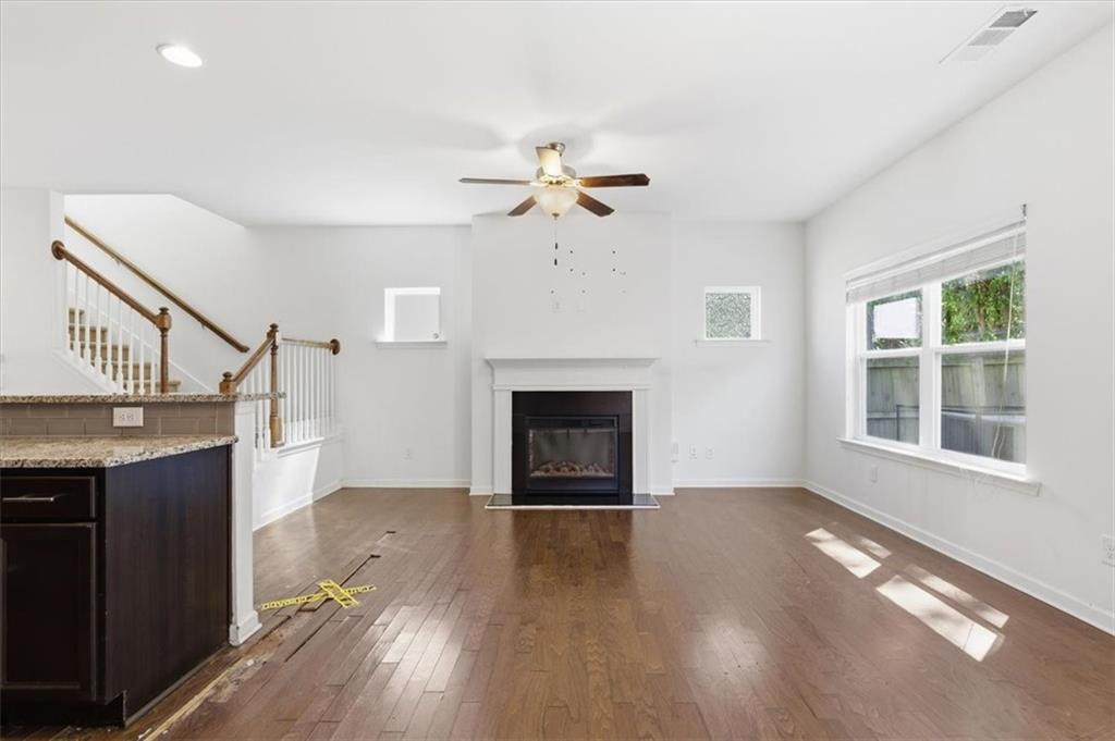 5064 Longview Walk Decatur, GA 30035 - Photo 11 of 30 a view of an empty room with a window and fireplace