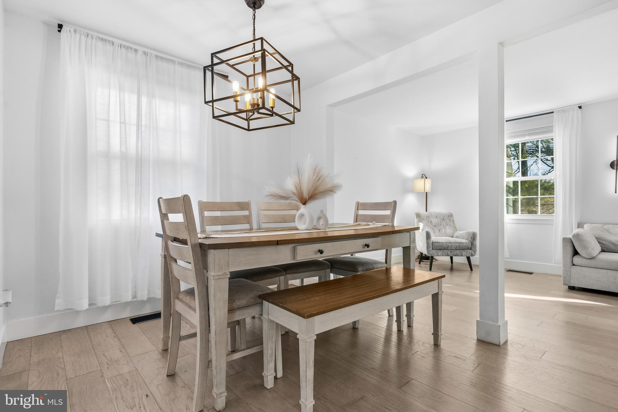 2901 Everleigh Way Fairfax, VA 22031 - Photo 11 of 34 a view of a dining room with a table and chairs