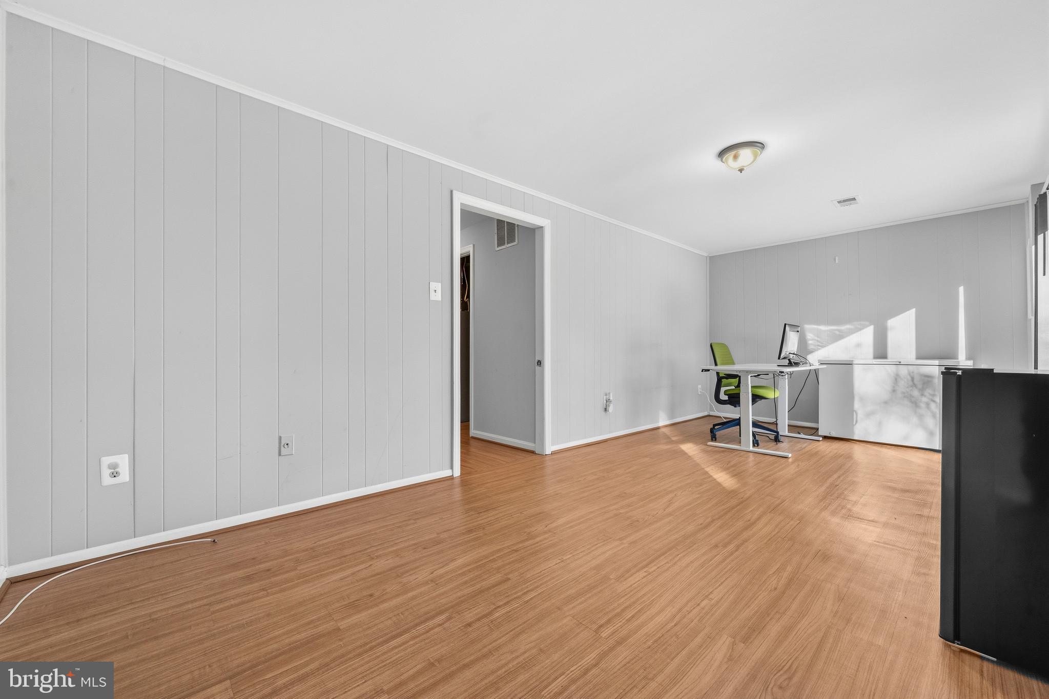 2901 Everleigh Way Fairfax, VA 22031 - Photo 24 of 34 a view of empty room with wooden floor