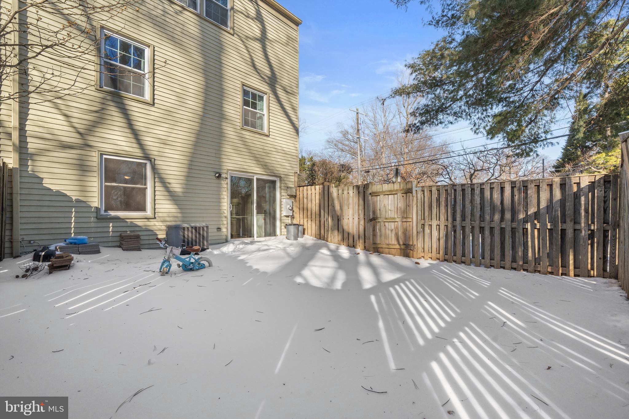 2901 Everleigh Way Fairfax, VA 22031 - Photo 29 of 34 a view of a house with a patio
