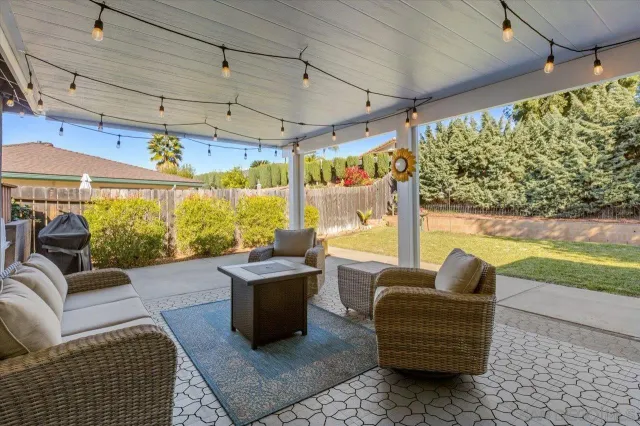 a outdoor living space with furniture and garden view