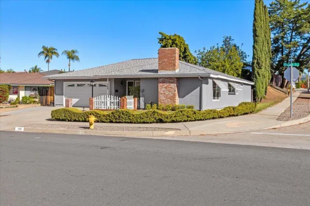 front view of a house with a street