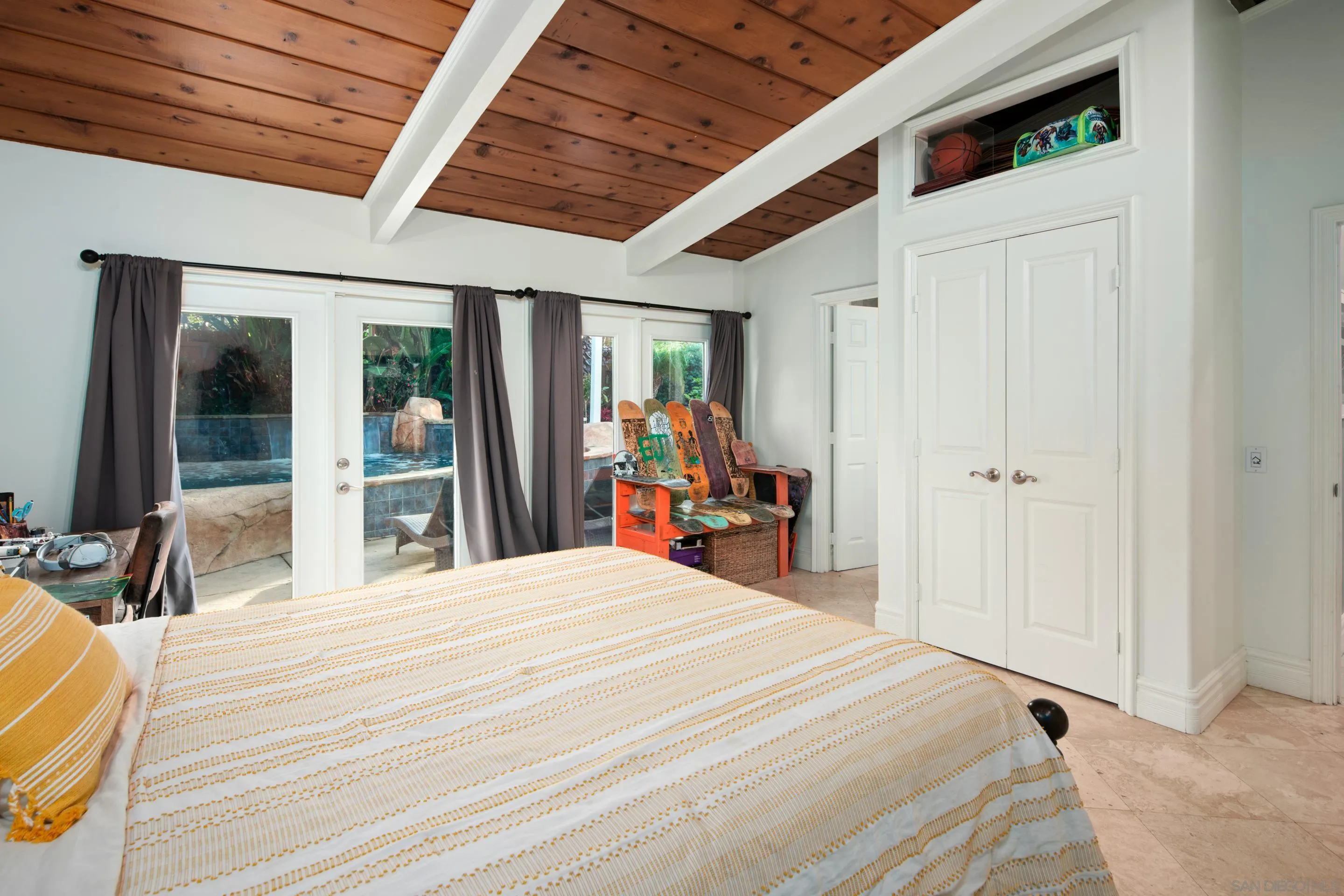 761 Ocean Crest Road Cardiff, CA 92007 - Photo 12 of 37 a bedroom with a bed and a large mirror