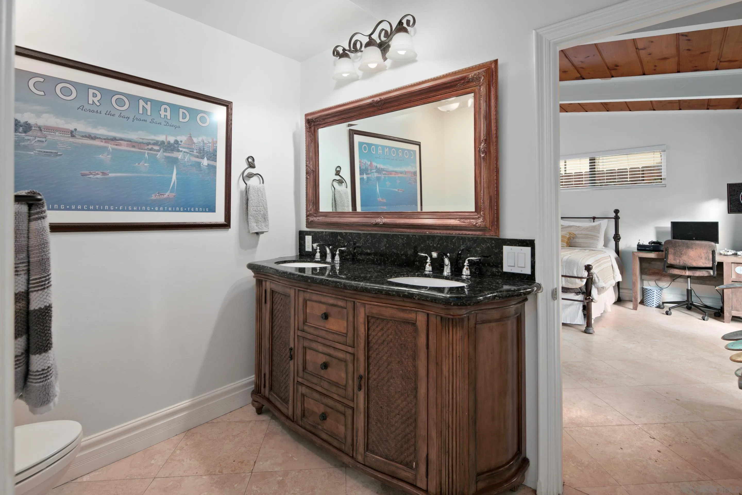 761 Ocean Crest Road Cardiff, CA 92007 - Photo 13 of 37 a bathroom with double sink and a mirror