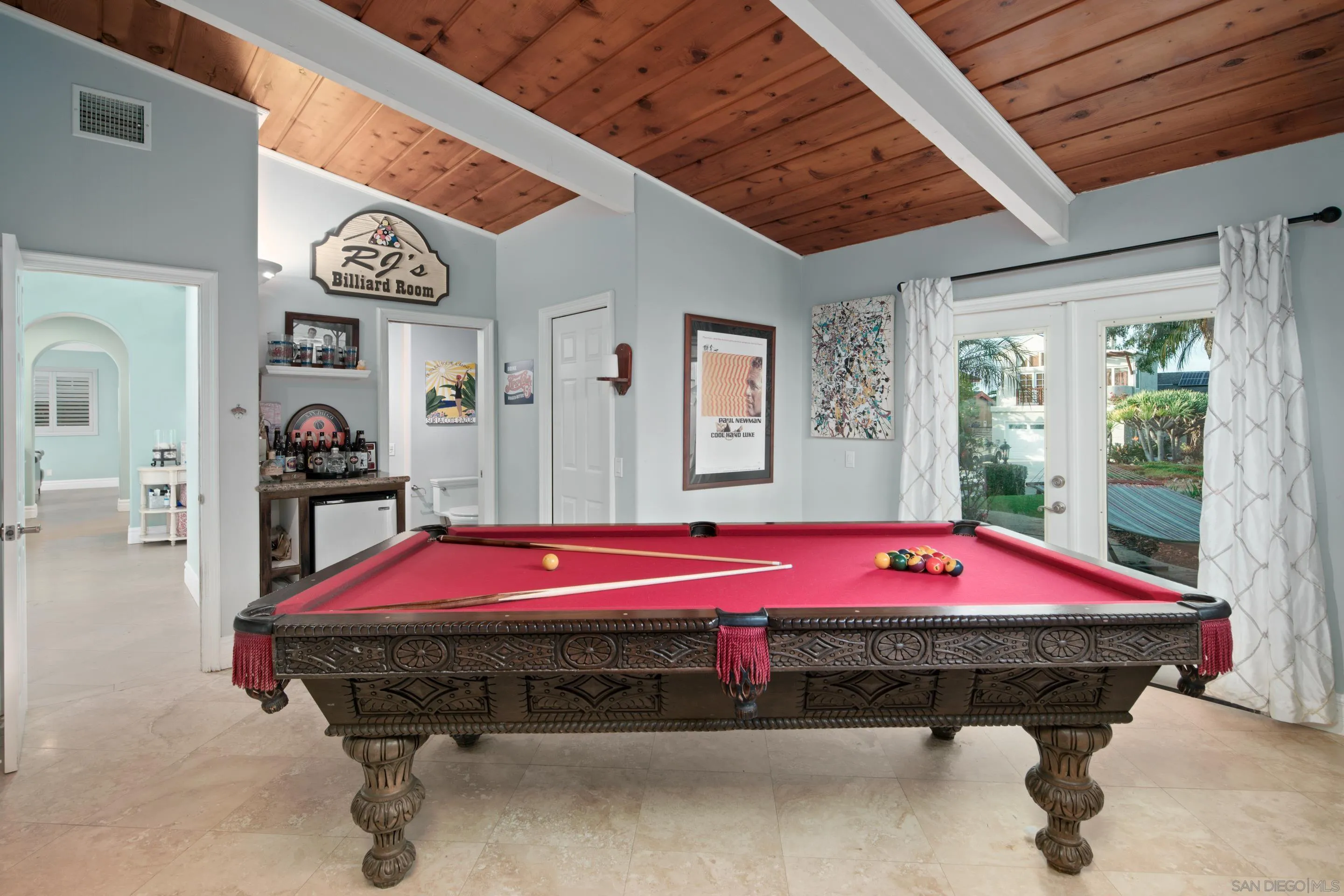 761 Ocean Crest Road Cardiff, CA 92007 - Photo 15 of 37 a pink room with bed and window