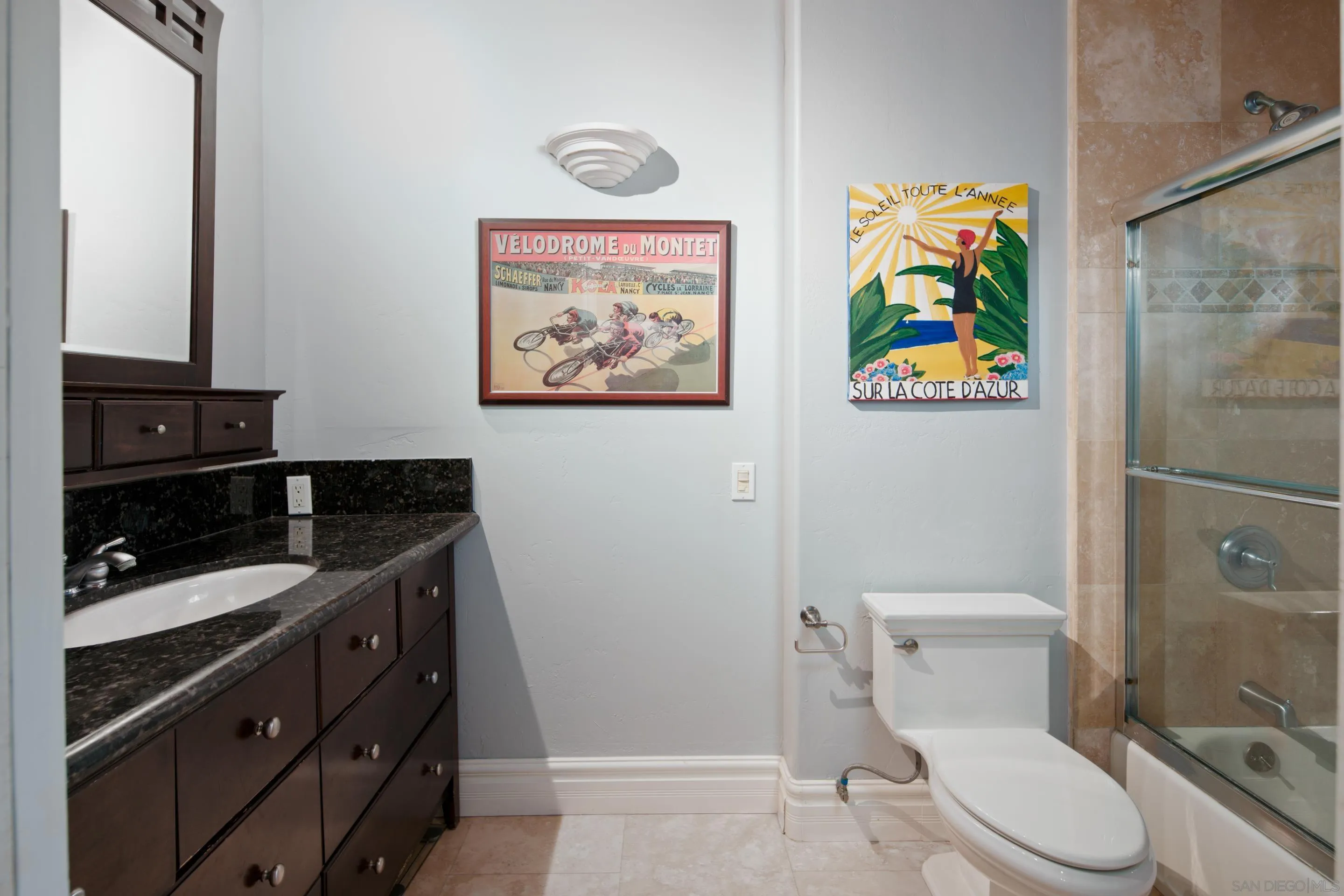 761 Ocean Crest Road Cardiff, CA 92007 - Photo 16 of 37 a bathroom with a toilet a sink and a shower