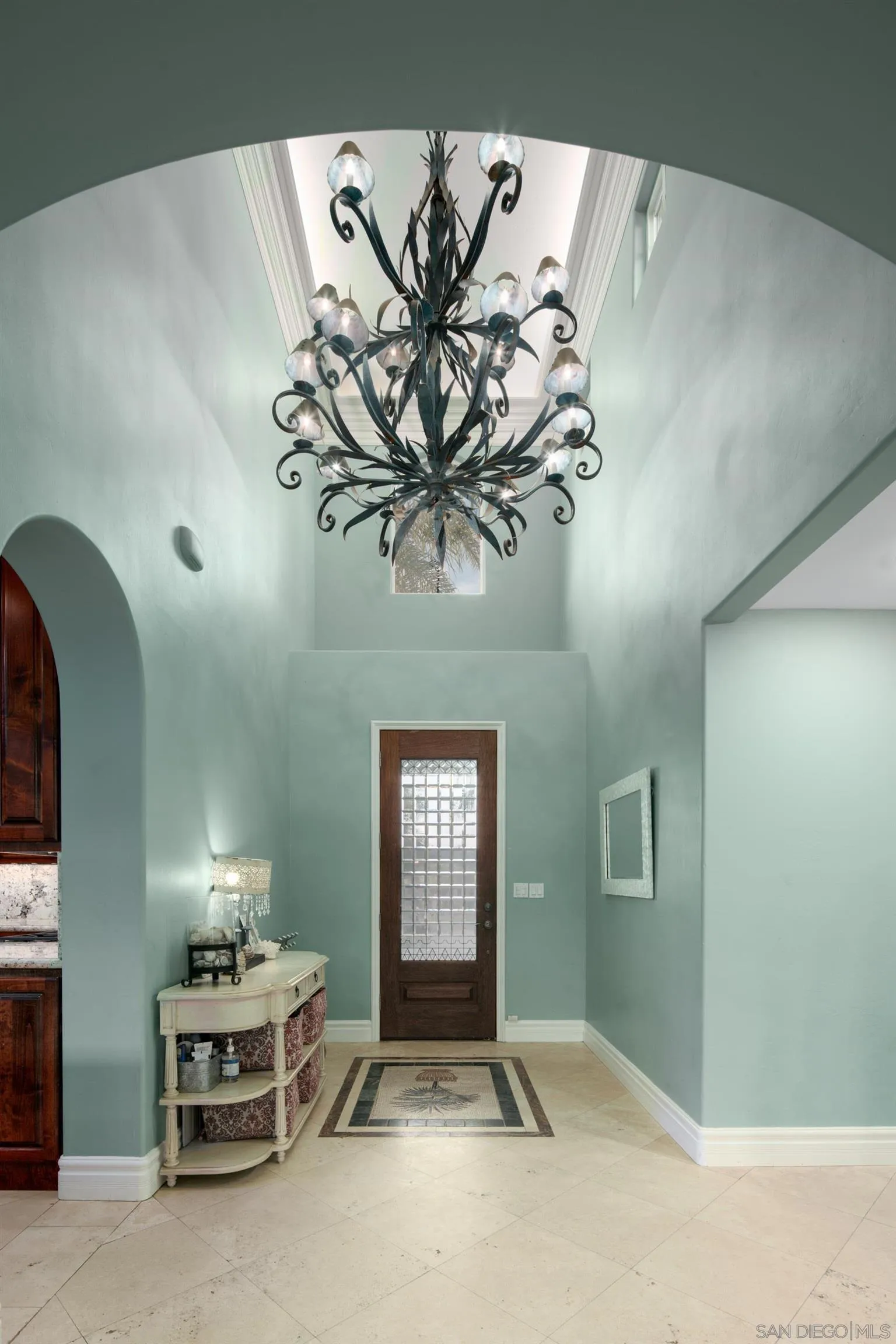 761 Ocean Crest Road Cardiff, CA 92007 - Photo 25 of 37 a view of a livingroom with furniture and chandelier fan