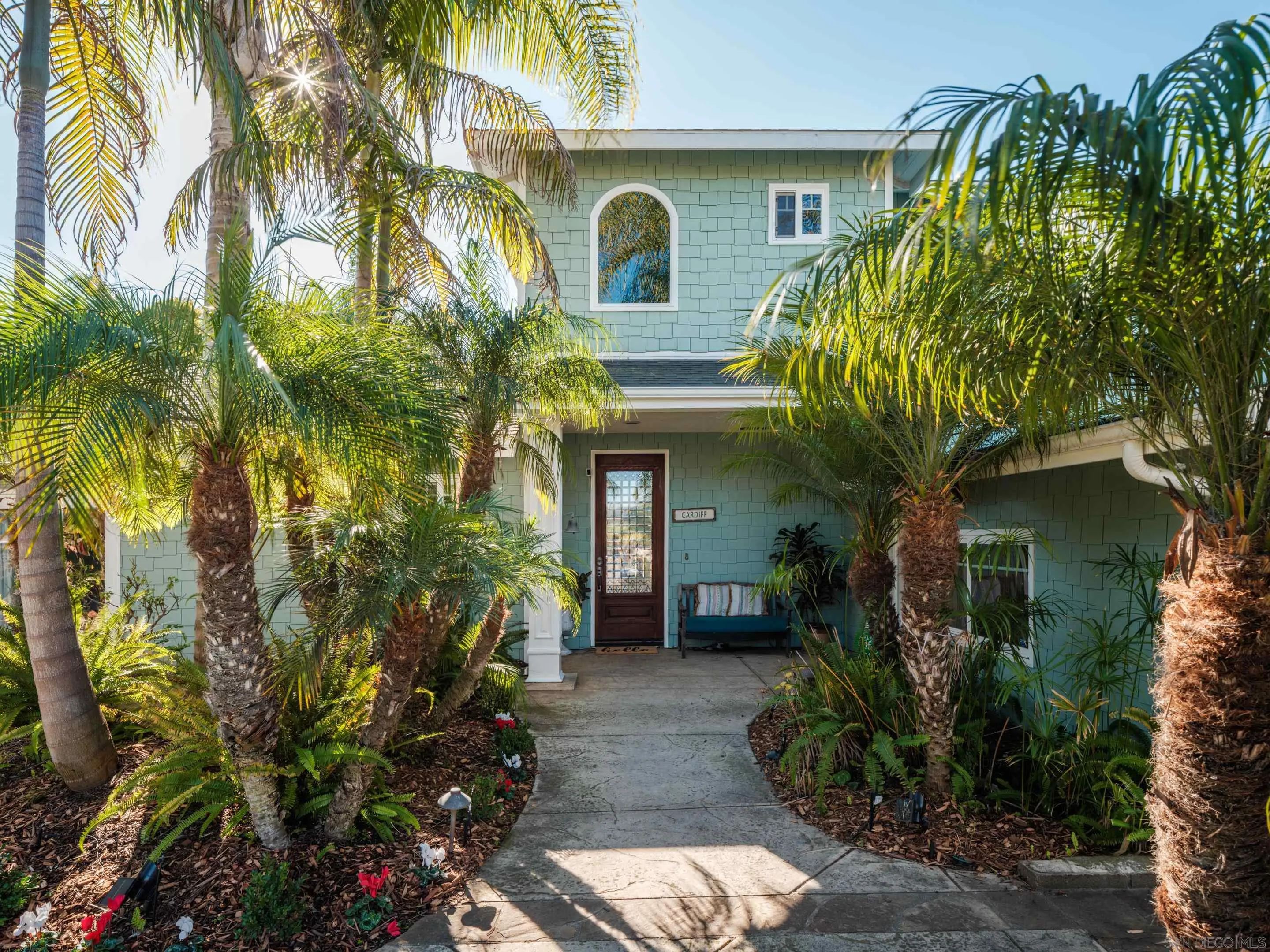 761 Ocean Crest Road Cardiff, CA 92007 - Photo 3 of 37 a front view of a house with a yard