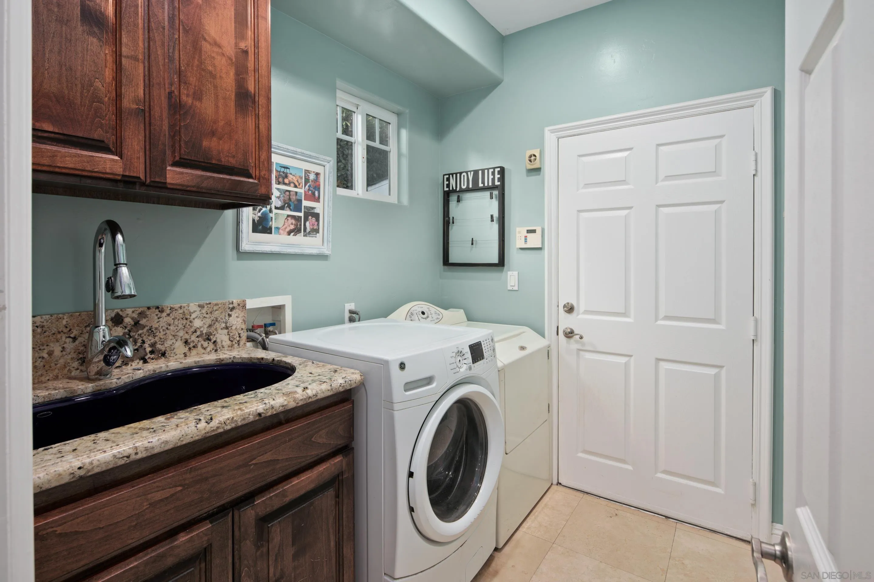 761 Ocean Crest Road Cardiff, CA 92007 - Photo 35 of 37 a utility room with dryer and washer