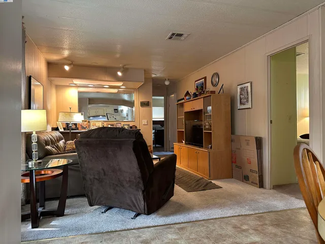 a room with lots of counter top space and furniture