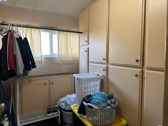 a room with furniture and a window