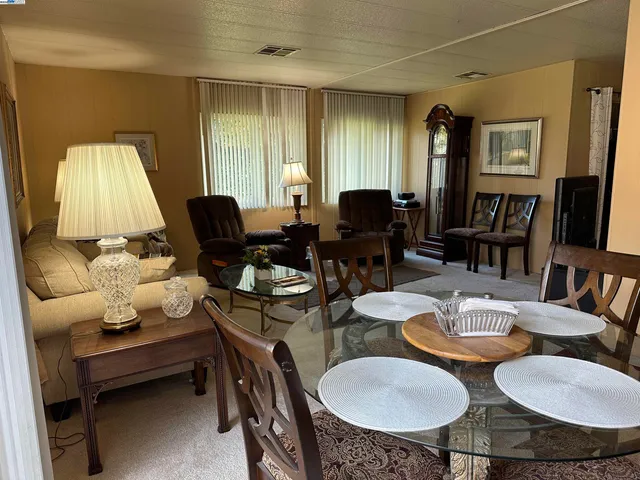 a dining room with furniture