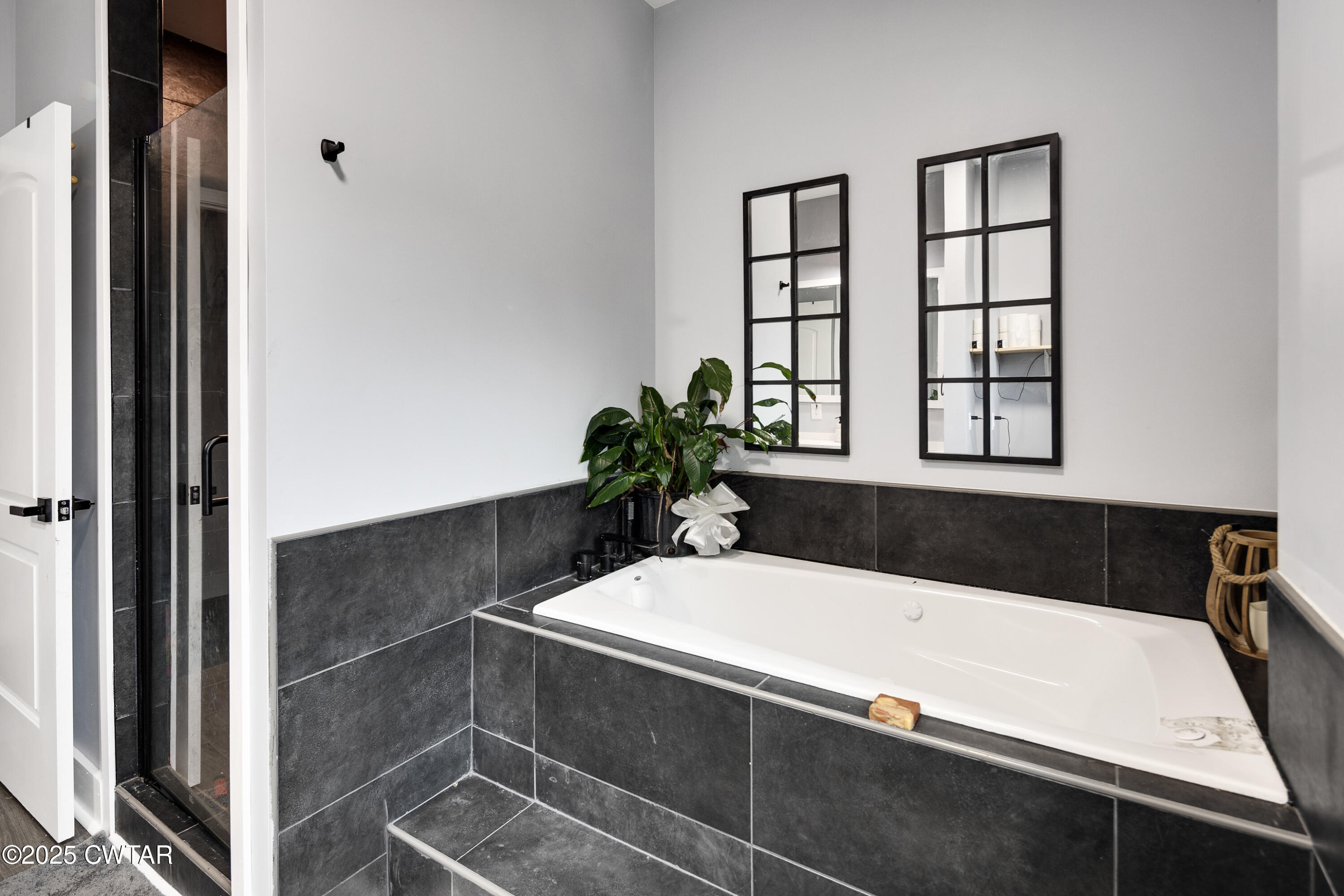 3670 Peavine Road Middleton, TN 38052 - Photo 14 of 29 a bathroom with a bathtub and sink