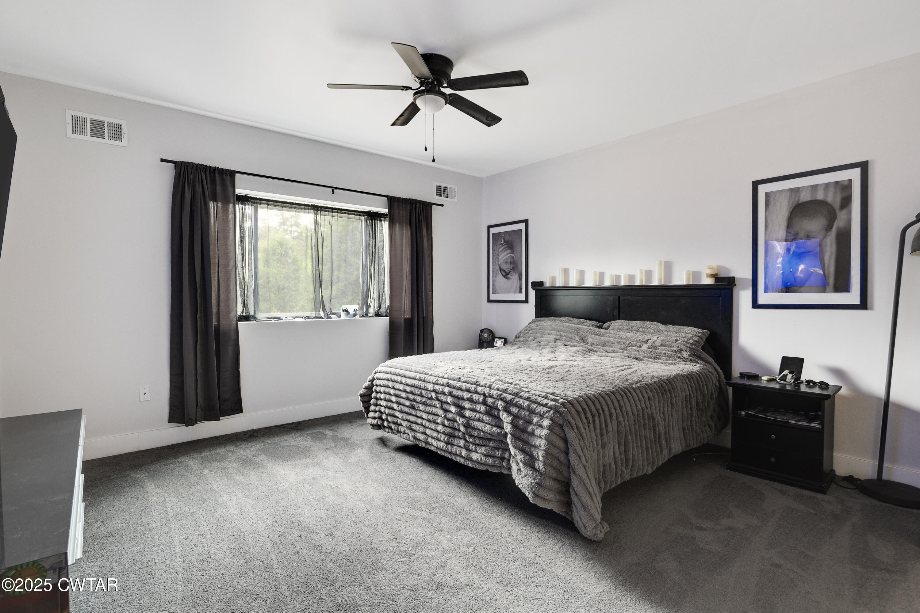 3670 Peavine Road Middleton, TN 38052 - Photo 15 of 29 a spacious bedroom with a bed and a window