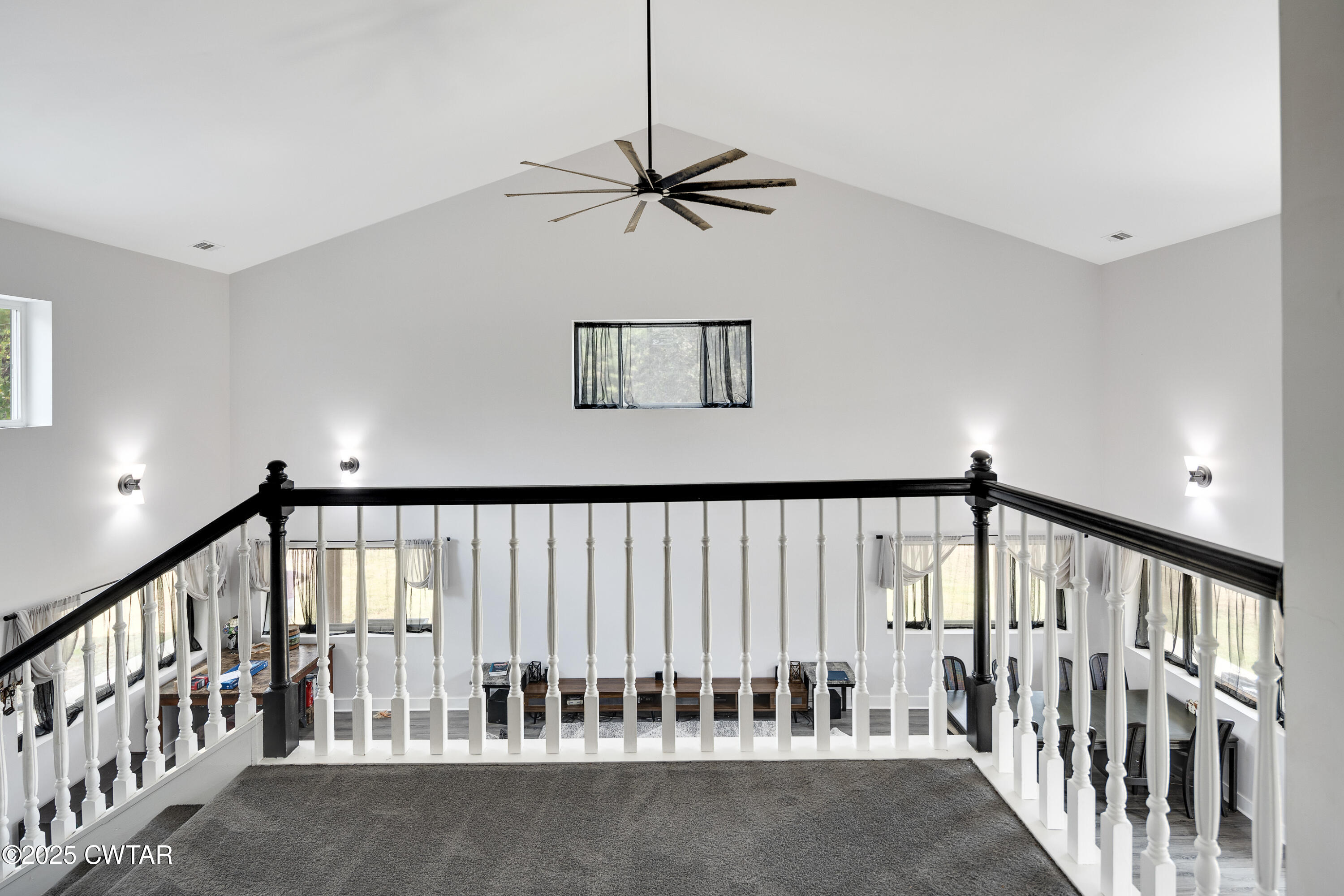 3670 Peavine Road Middleton, TN 38052 - Photo 19 of 29 a view of staircase with railing and white walls