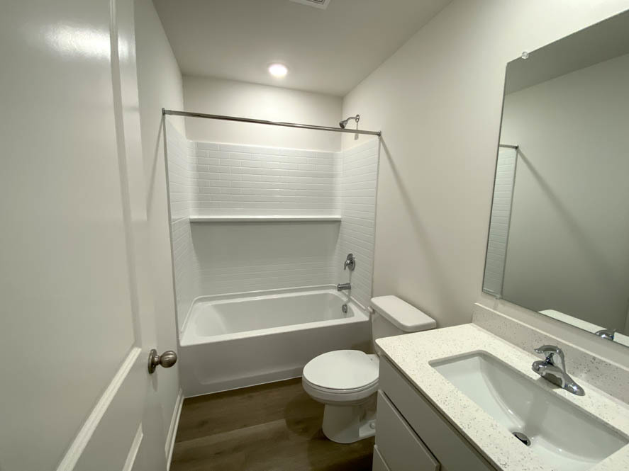 561 Yosemite Way Mundelein, IL 60060 - Photo 19 of 48 a bathroom with a sink toilet and shower