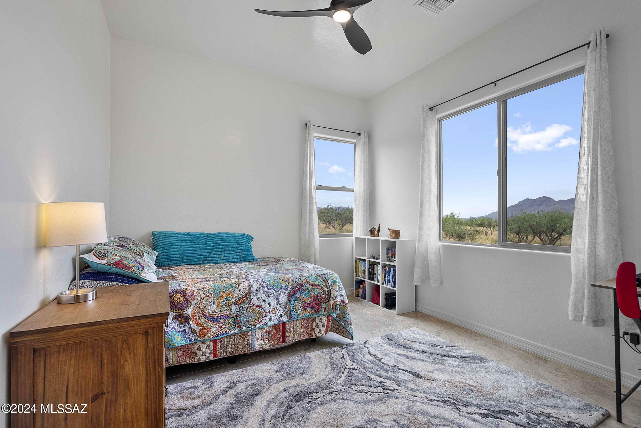 22 Vigas Lane Rio Rico, AZ 85648 - Photo 8 of 40 a bedroom with a bed and a window