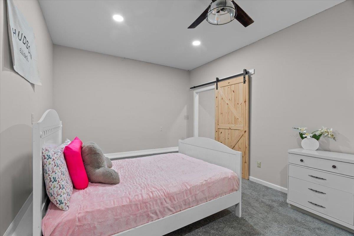 150 Liberty Road Moscow, TN 38057 - Photo 21 of 36 Room featuring light gray walls, recessed lighting, and a ceiling fan with a dark wood-finish
