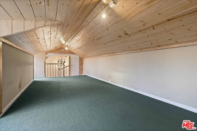 a view of empty room with windows