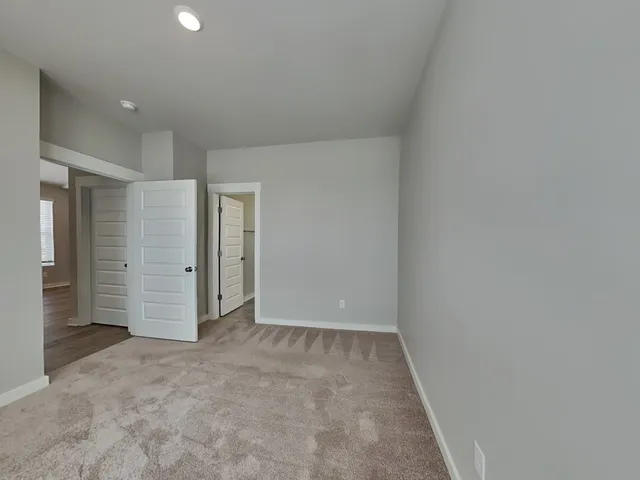 an empty room with closet