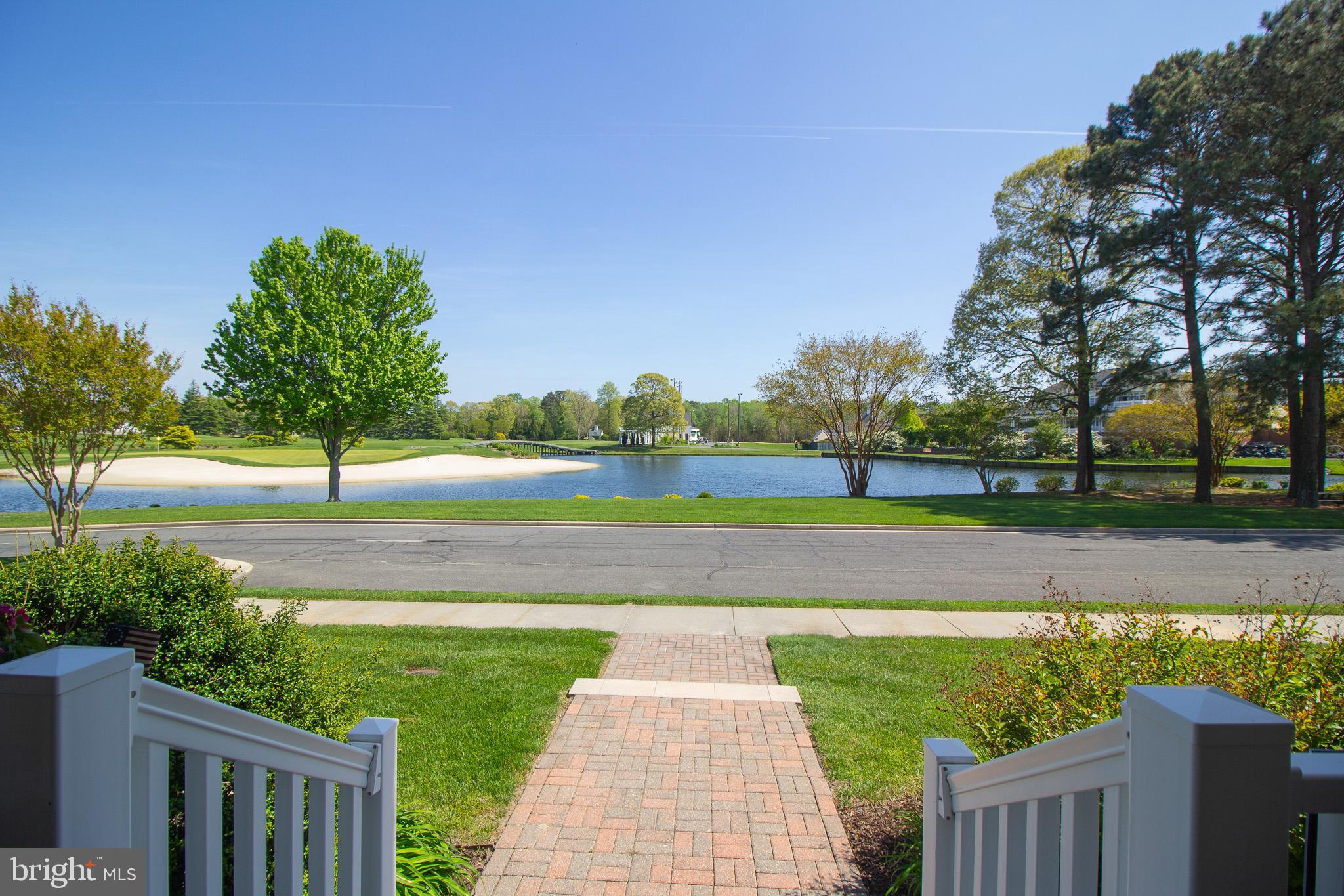 32377 Back Nine Way, Unit 3747 Long Neck, DE 19966 - Photo 1 of 41 a view of a park with large trees