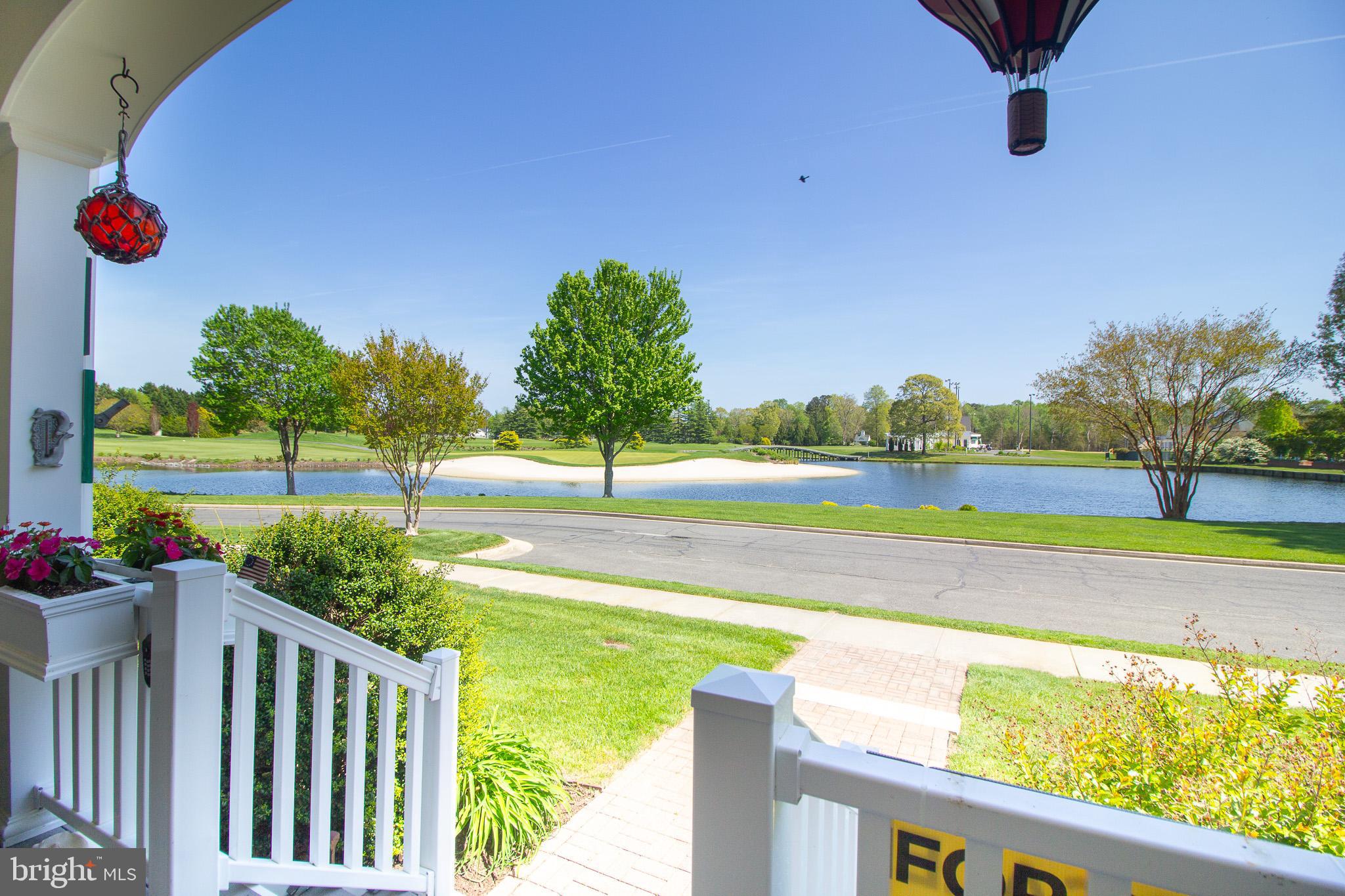 32377 Back Nine Way, Unit 3747 Long Neck, DE 19966 - Photo 2 of 41 a view of an outdoor space and swimming pool