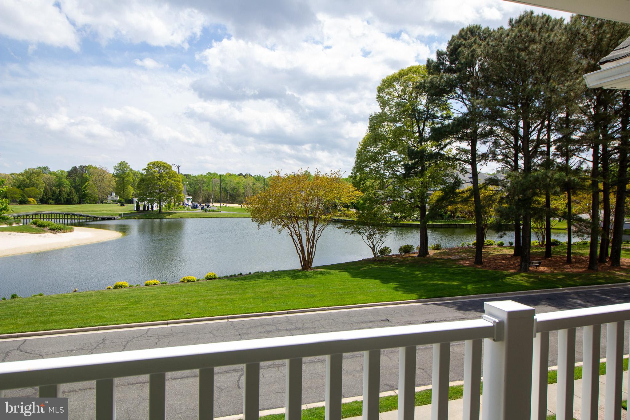 32377 Back Nine Way, Unit 3747 Long Neck, DE 19966 - Photo 32 of 41 a view of lake from a yard
