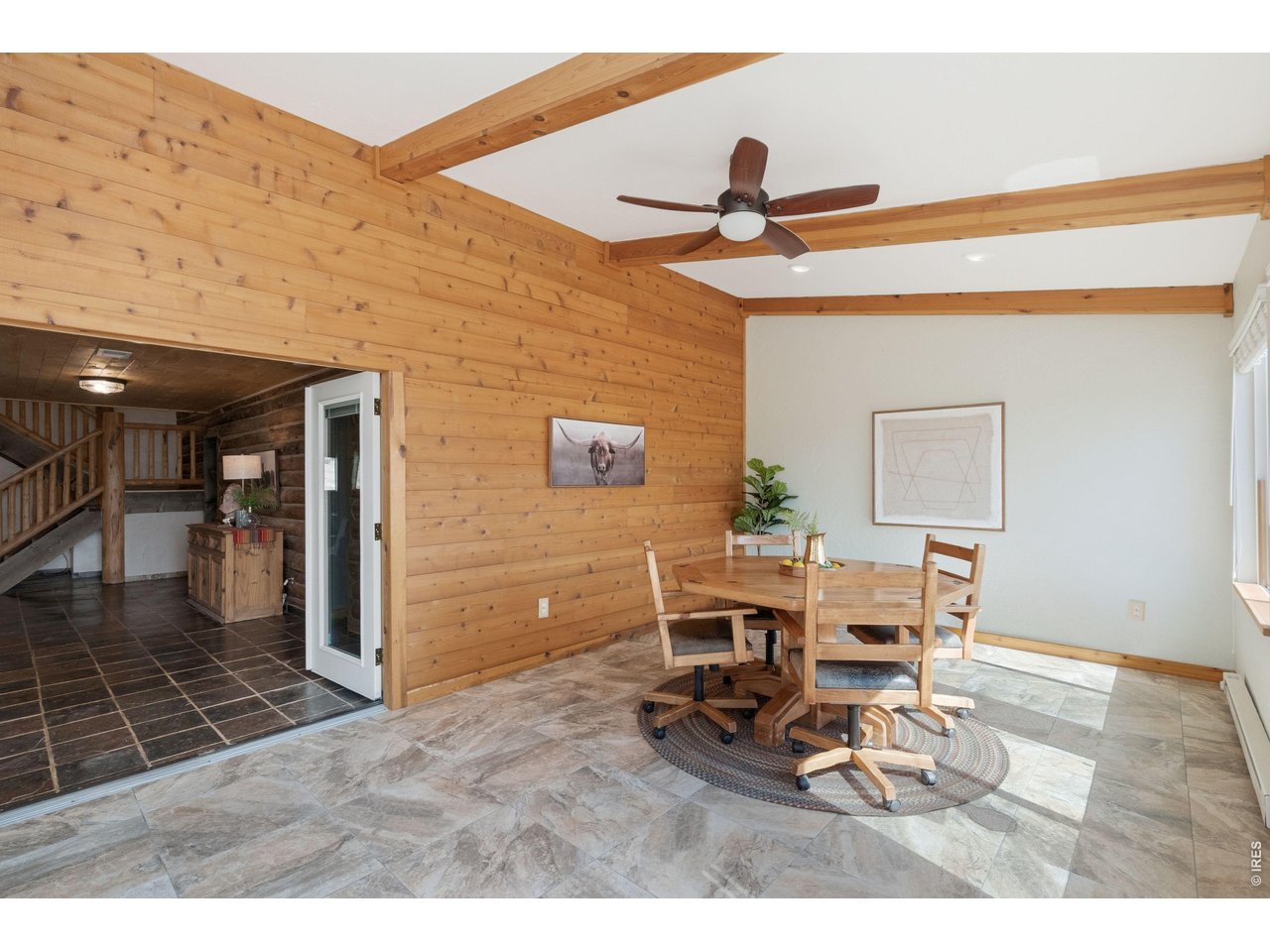 54 Rist View Road Bellvue, CO 80512 - Photo 4 of 50 Ceiling Fan and Cedar Siding in Sun Room!