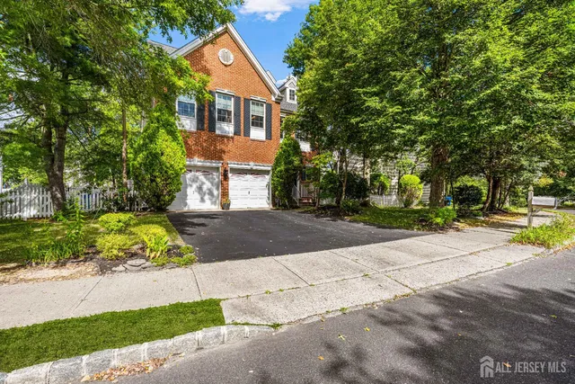 a dining room with a table and chairs