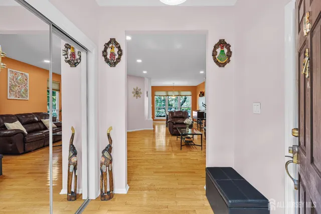 a kitchen with granite countertop a stove top oven cabinetry a sink and dishwasher