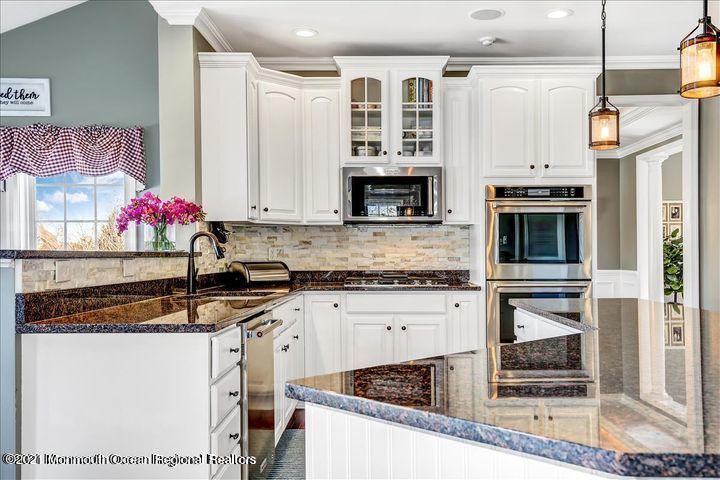5 Jake Drive Cream Ridge, NJ 08514 - Photo 12 of 64 a kitchen with granite countertop a stove and cabinets