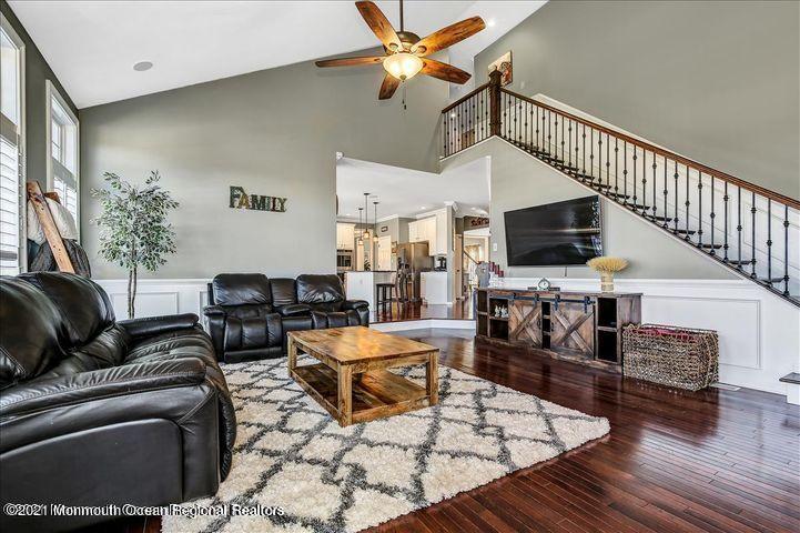 5 Jake Drive Cream Ridge, NJ 08514 - Photo 20 of 64 a living room with furniture and a flat screen tv