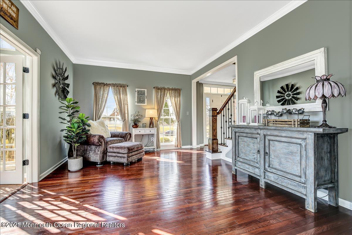 5 Jake Drive Cream Ridge, NJ 08514 - Photo 23 of 64 a living room with furniture and wooden floor