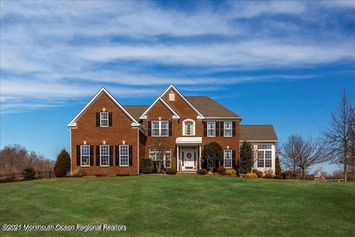 5 Jake Drive Cream Ridge, NJ 08514 - Photo 4 of 64 a front view of a house with a garden