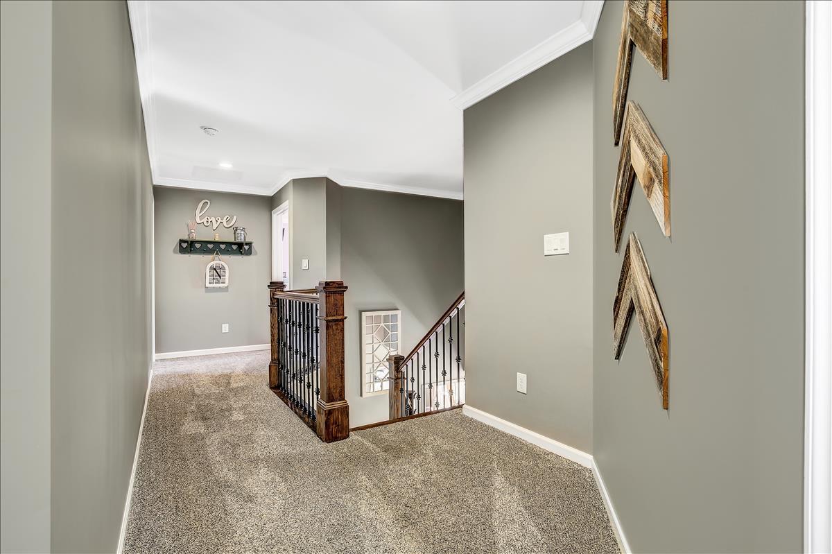 5 Jake Drive Cream Ridge, NJ 08514 - Photo 31 of 64 a view of staircase with lots of frames on wall